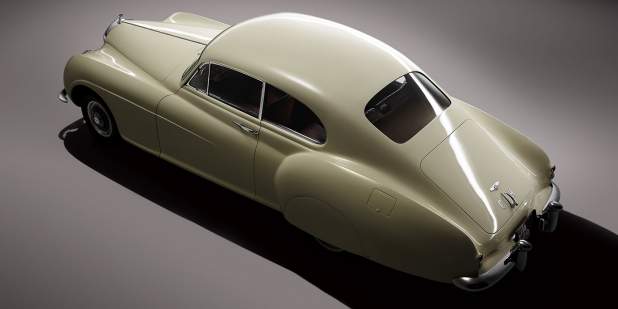 Rear view of a pearl coloured Bentley R-type Continental | Bentley Motors
