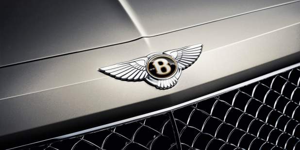 Bentley Centenary SpecBentayga Badge ExtremeSilver 1398x699.jpg